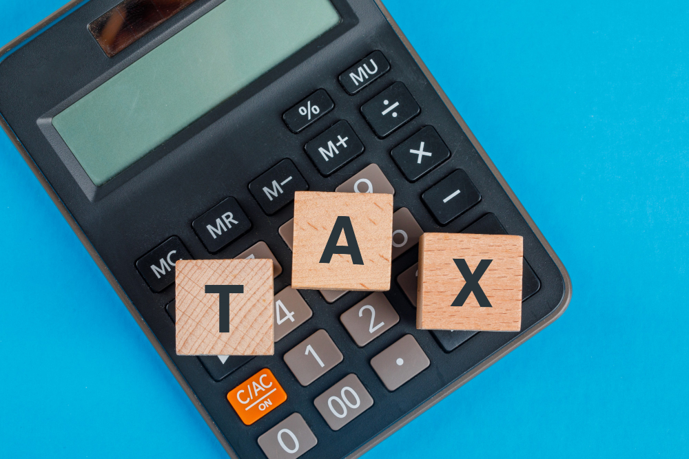 Professional calculating corporate tax figures