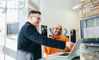 Corporate leaders planning growth with digital tools and charts