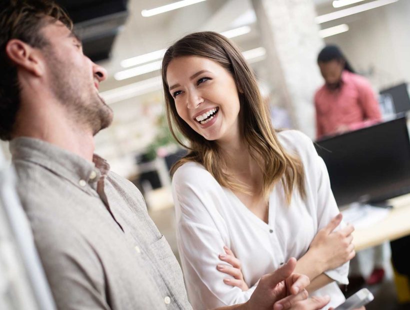 CorpAlly professionals working together in a collaborative environment