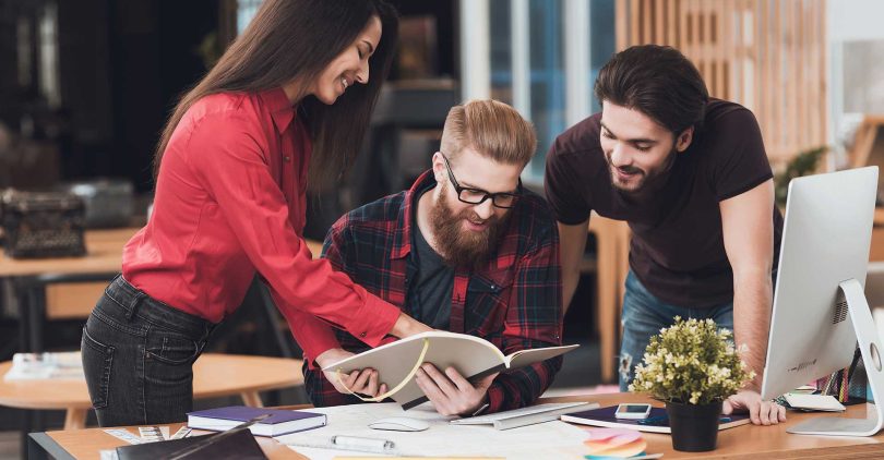 CorpAlly team working on a client project